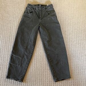 PAIGE Boot Cut Jeans in khaki green.